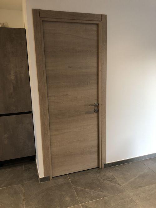 Chantier client, installation d'une porte d'intérieur