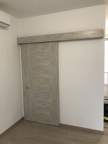 Chantier client, installation d'une porte d'intérieur coulissante